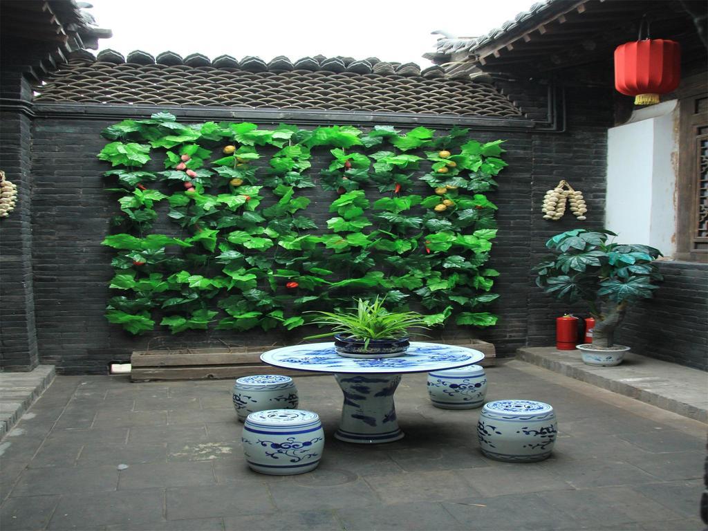 Pingyao Yiguan Folk Custom Inn Номер фото
